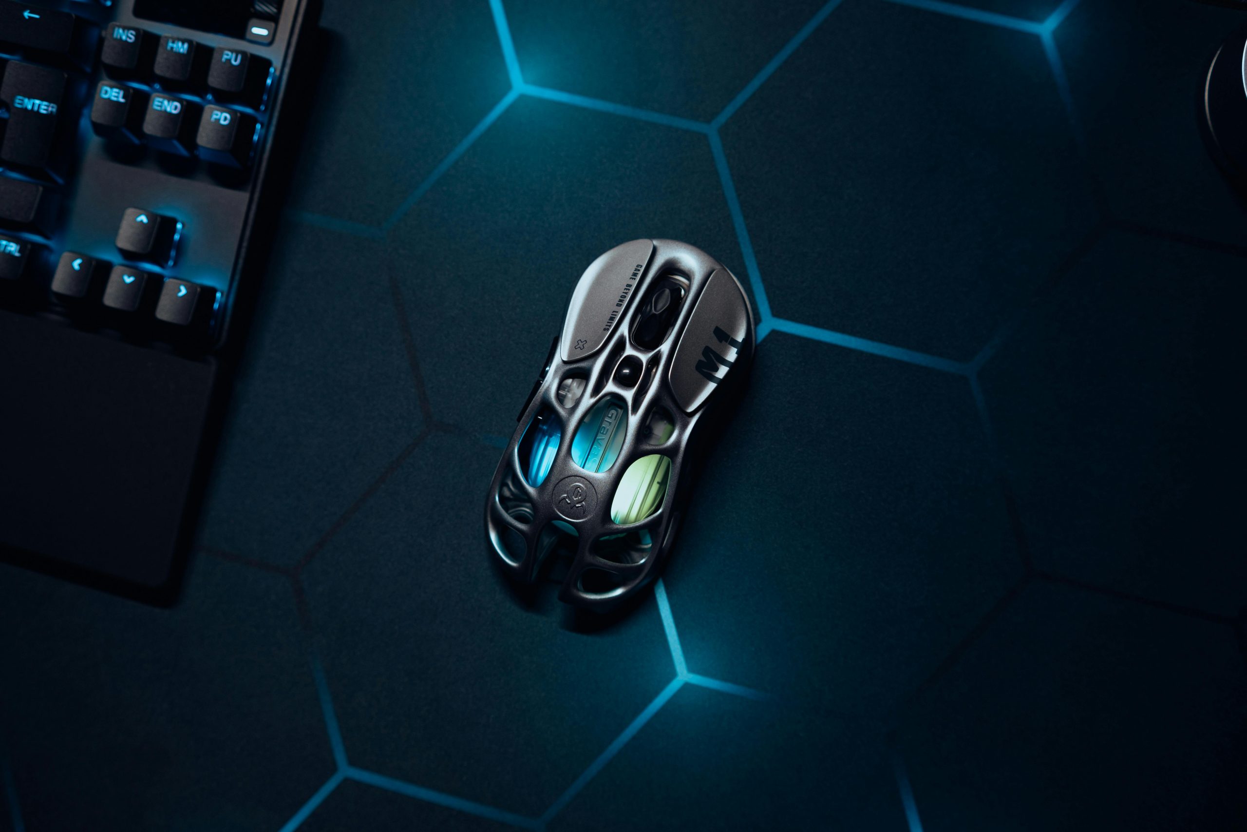 Futuristic Gaming Mouse on Dark Hexagonal Surface